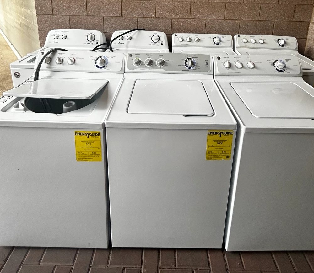 Rows of white top-load washers lined up